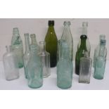 Collection of various bottles including green, cods, some brown etc, child's feeding bottle etc