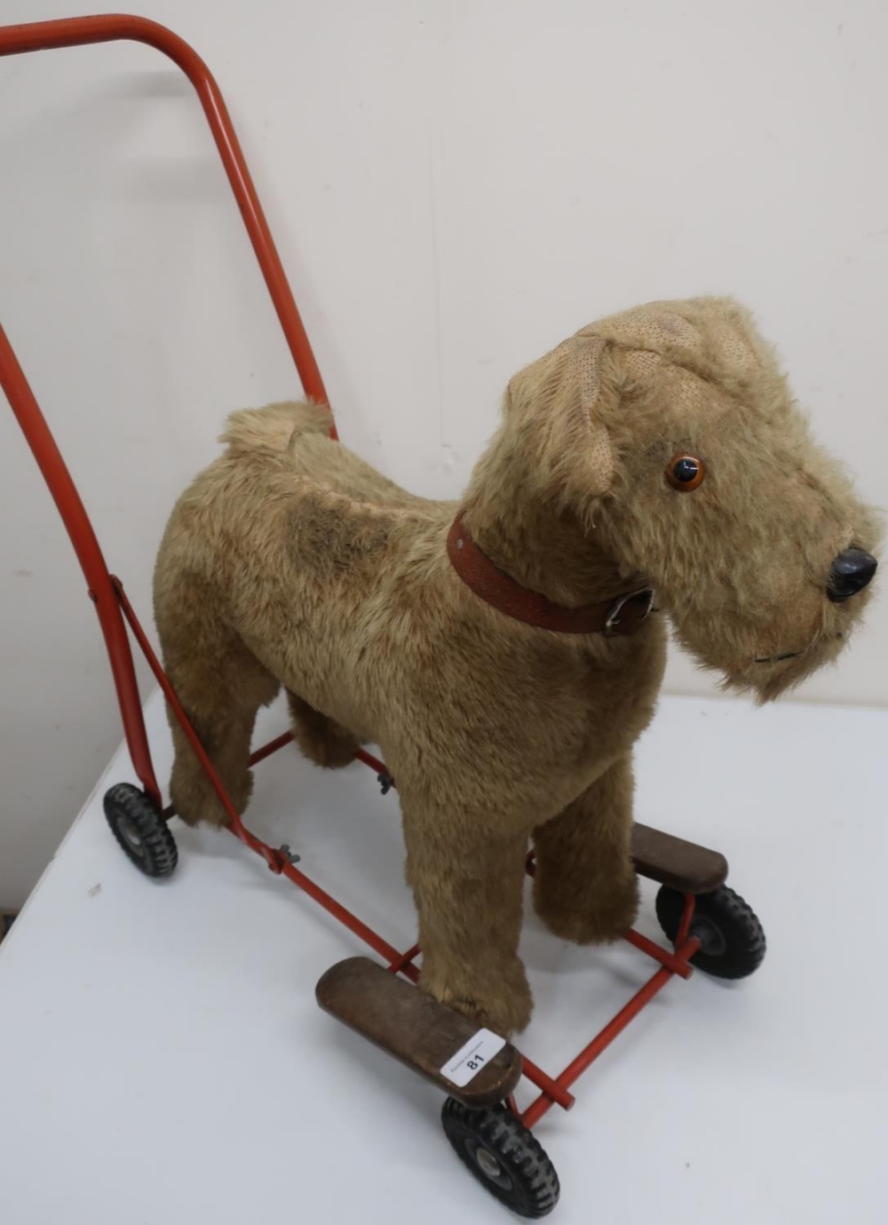 Lines Tri-ang plush wheeled model of a dog on steel frame and a Bantel child's metal cycle with