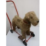 Lines Tri-ang plush wheeled model of a dog on steel frame and a Bantel child's metal cycle with