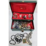 Cantilever jewellery box containing a quantity of costume jewellery, necklaces, bracelets etc