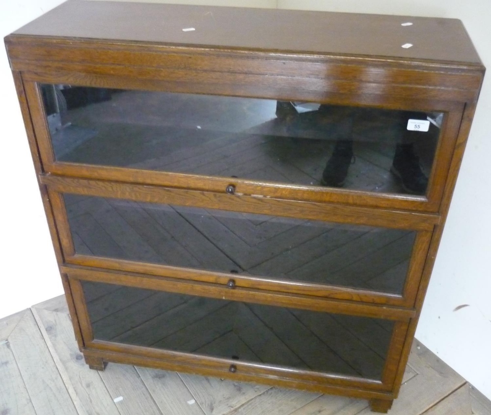 20th C Globe Wernicke style oak bookcase with three glazed doors (90cm x 100cm x 29cm)