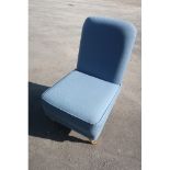 Laura Ashley nursing chair upholstered in blue self patterned fabric, on turned supports