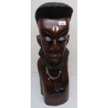 Unusually large carved Eastern hardwood bust of a male, inlaid with bone and with painted