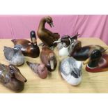 Collection of various carved wood and composite figures of various ducks, including pintail