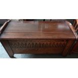 Oak blanket box with carved detail to the front and hinged lift up top (100cm x 48cm x 48cm)