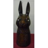 Unusual Black Forest carved wooden tobacco jar in the form of a Rabbit, the head with white glass