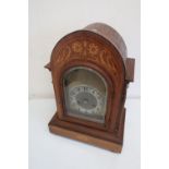 Edwardian walnut inlaid bracket clock with striking movement enclosed by bevelled edge glass
