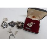 Two Siam sterling silver brooches, a pendant and pair of earrings, a sterling silver crucifix and