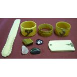 Victorain ivory aide-memoire, bone paper knife, three bone napkin rings and four small polished