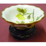 20th C cloisonne bowl decorated with yellow flowers on a white ground, on ebonised stand, (13cm x