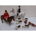 Beswick hunting group, mounted lady and gentlemen, six hounds and two foxes, (10)