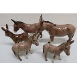 Five Beswick models of donkeys (height max 15.5cm) (5)