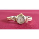 Ladies 9ct gold cased Rotary wristwatch on gold plated expanding strap