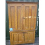 Late Victorian scumbled pine kitchen cupboard, with four twin panel doors, on turned feet (180cm x
