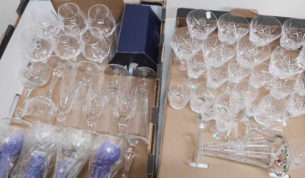 Suite of Stuart crystal glassware, comprising glasses, champagnes, liquors, tumblers, mostly unused,