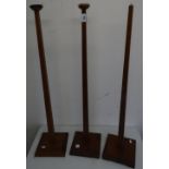 Set of three stained pine shop style display stands of square tapering forms (approx height 92cm)