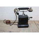Early railway telephone, black body with gilt detail and hand crank, with test label to interior (