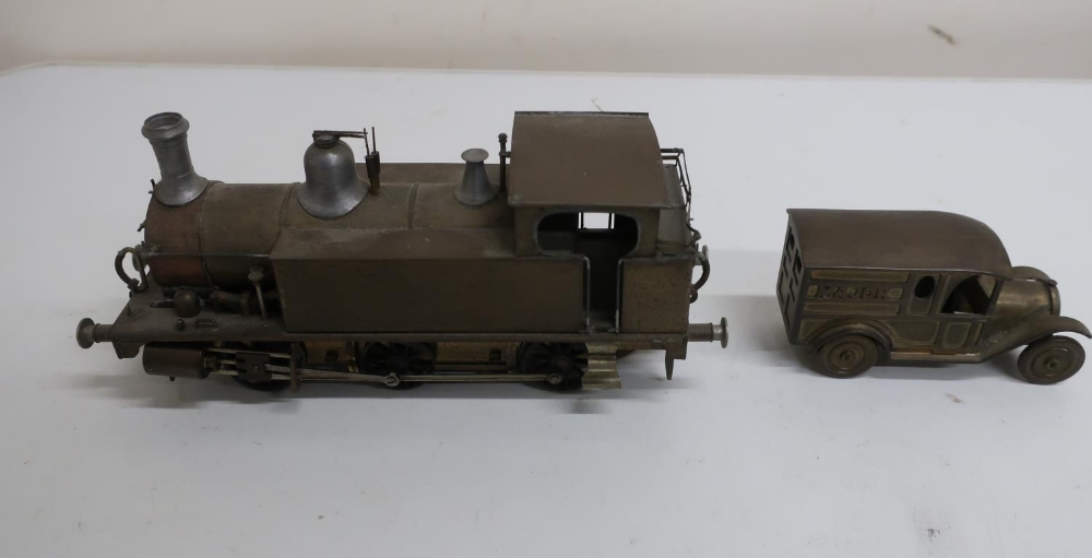 Kit built brass electric model of a 0-6-0 locomotive, and a small brass model of a vintage