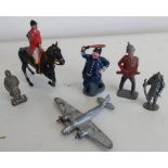 Four Dinky small scale model die-cast aeroplanes, and a quantity of lead and other metal soldiers,