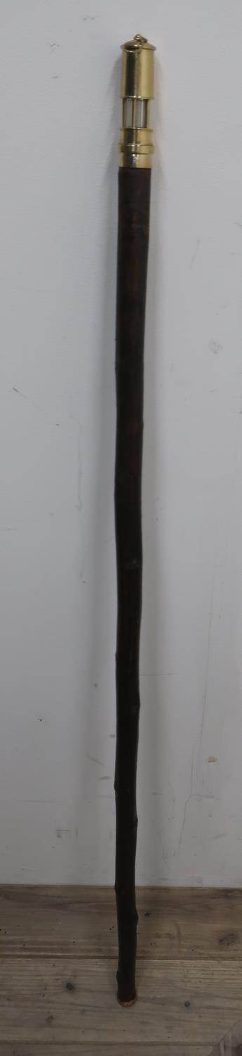 Walking stick with miniature miners lamp top