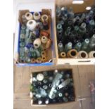 Collection of bottles, including green cods etc, clay bottles, ink wells etc (three boxes)