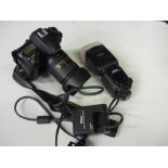Nikon D7000 camera body and grip, Nikon 16-85mm 3.5-56 G ED VR lens, Nikon SB900 speed light flash