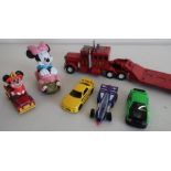 Collection of various scale die-cast toys including tractors, Hot Wheels etc