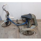 Raleigh child's tricycle, with blue frame, mudguards, rear basket and front rod brake