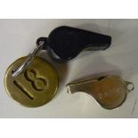 Acme Thunderer whistle stamped (BRNE), and a Acme plastic whistle marked BR with large brass tag
