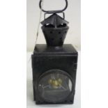 Early black Japanned metal railway lamp, with clear lenses and internal burner, the case painted W