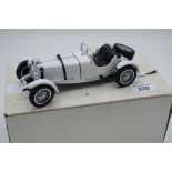 Mint boxed collectors 124 scale die-cast model of a 1931 Mercedes Benz SSKL by the Danbury Mint,