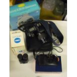 Canon EOS 1000F hand lens, Ricoh FF9 35mm Auto Focus camera in box, pair Minolta pocket binoculars