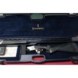 Cased Browning Cynergy 12B over and under ejector shotgun with 32 inch barrels with extended and