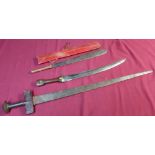 African sword with 28 inch double edged blade, steel grip and leather mounted crosspiece, similar 12