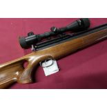 Logun Hacksaw .177 pre-charge pneumatic air rifle with walnut thumb hole stock serial no. 007819 and