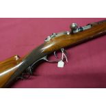 Mauser bolt action 28 Bore single barrel shotgun with elaborate carved horn trigger guard and raised