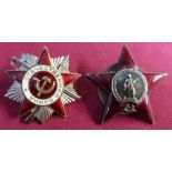 Two Russian Soviet military cap badges including red enamel badge with central figure on an Infantry