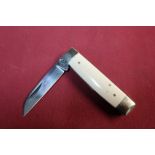 Single bladed pocket knife with ivory grips and working back detail