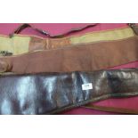 Padded gun slip and two canvas and leather bound Brady style slips (3)