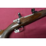 Mauser M98 .243 stalking rifle with walnut stock and rings and bases, serial number 007626 (