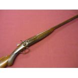 Midland Gun Co 12 bore single barrel hammer gun with 30 inch brown twist Damascus barrel and rounded