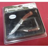 Boxed ex shop stock Remington special edition R60018 twin knife set and tin