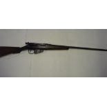 Lee-Metford Rifle converted to shotgun, bolt action .410, with detachable magazine and brass butt