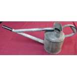 Galvanised long spouted watering can, the base with impressed swastika mark (height 28cm)