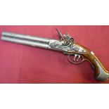 Decorative replica of a flintlock over and under pistol