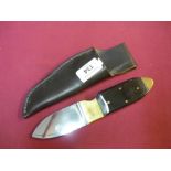 3 inch broad bladed sheath knife by R Cooper of Sheffield, with polished horn and brass mounts,