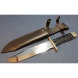 Extremely large Sheffield made Bowie knife by R. Cooper with 10 inch blade, brass crosspiece and two