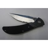 Boxed as new Whitby Knives folding knife with 3 inch black blade and black pierced handle