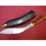 Quality Nepalese Kukri knife with 12 inch blade with signature digits, brass mounts and wooden