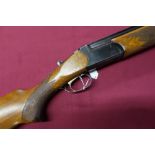 Sariugarte 12B over and under shotgun, with 27 1/2 inch barrels, serial no. 43659 (shotgun